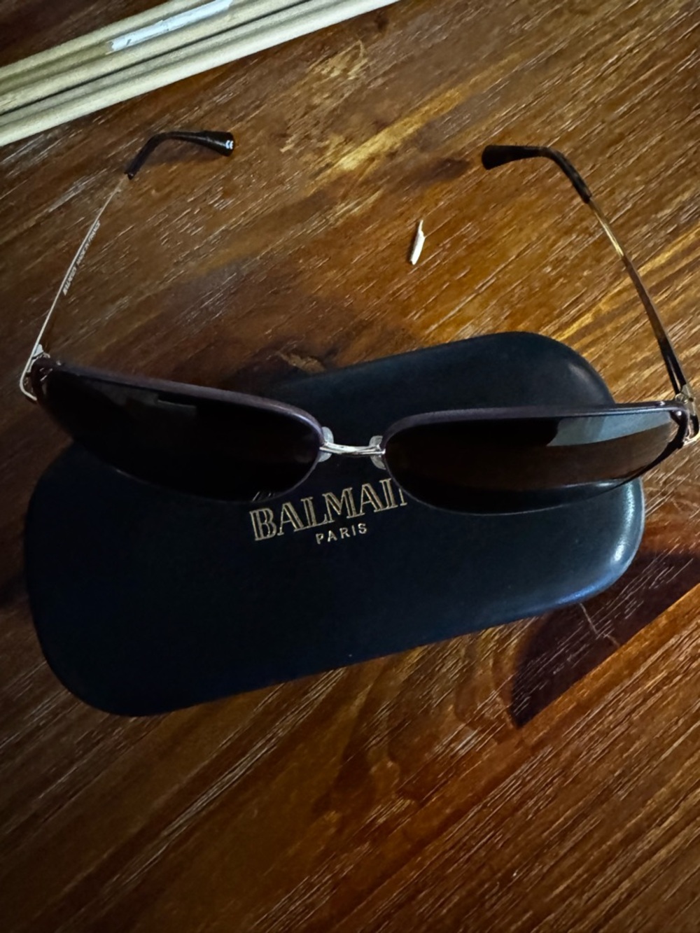Balmain Slim Oval Sunglasses in Black and Brown